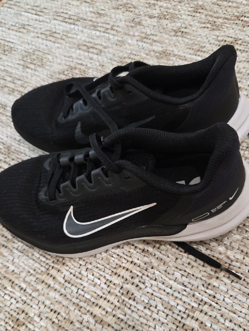 Nike Black Sneakers with White Swoosh